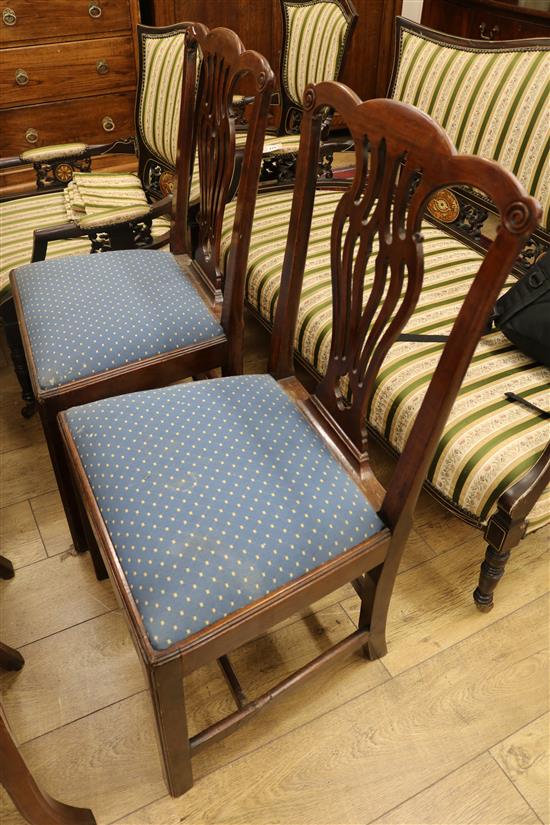 A pair of George III mahogany dining chairs